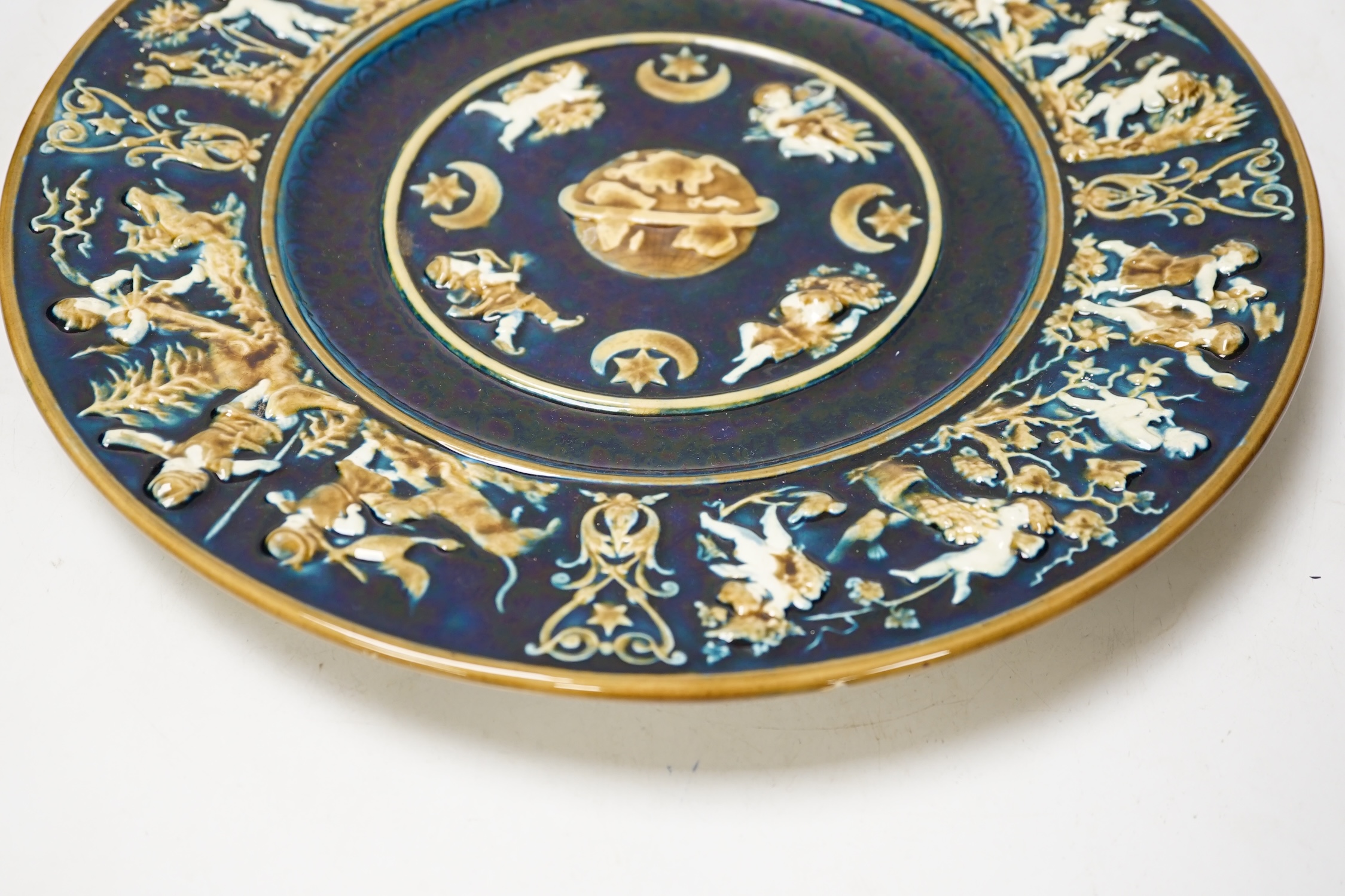 A late 19th century Schulz Blansko majolica relief wall plate, 36cm in diameter. Condition - good